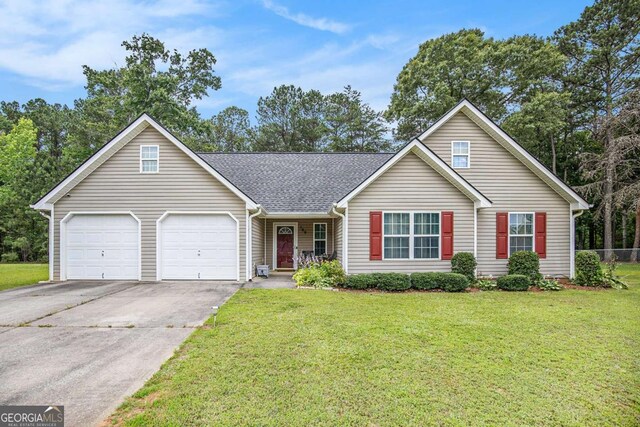 169 Winding Valley Dr, Rockmart, GA 30153 - view of front of property with an attached garage, driveway, a front lawn, and a shingled roof