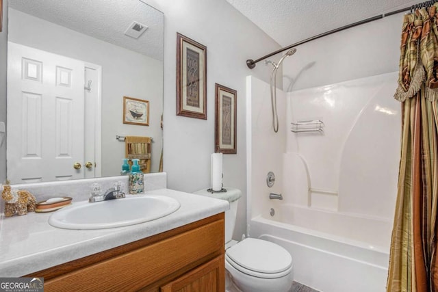 169 Winding Valley Dr, Rockmart, GA 30153 - full bathroom with shower / bath combo with shower curtain, vanity, and a textured ceiling