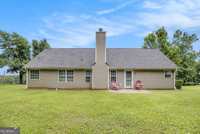 169 Winding Valley Dr, Rockmart, GA 30153 - back of property featuring a patio area, a chimney, a yard, and a shingled roof