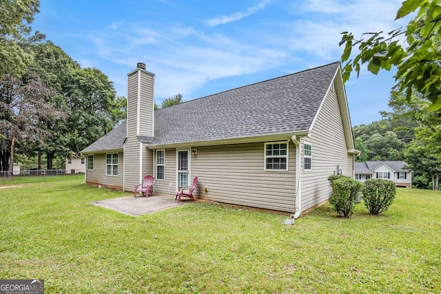 169 Winding Valley Dr, Rockmart, GA 30153 - back of house with a patio area, a chimney, and a shingled roof