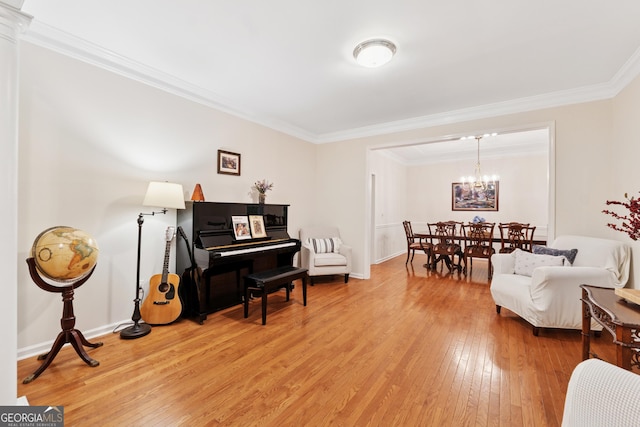 2722 Brookhaven Ln, Buford, GA 30518 - living area with light wood-style floors, crown molding, and a chandelier