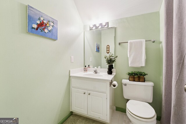 2722 Brookhaven Ln, Buford, GA 30518 - bathroom featuring vanity, vaulted ceiling, and tile patterned floors