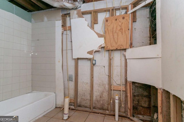 2582 Springdale Rd SW, Atlanta, GA 30315 - full bathroom featuring a tub to relax in and tile patterned floors