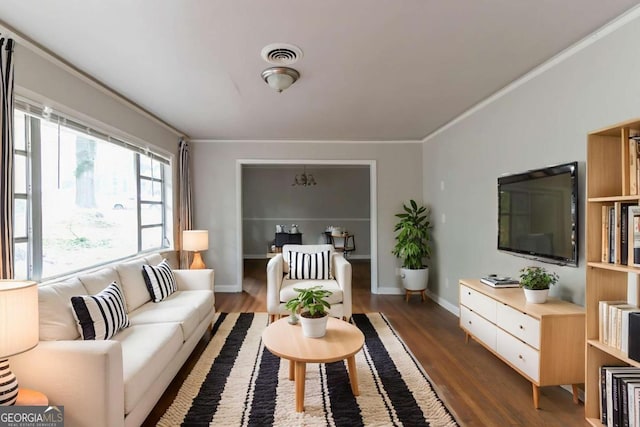 2582 Springdale Rd SW, Atlanta, GA 30315 - living area with ornamental molding, dark wood-style floors, and baseboards