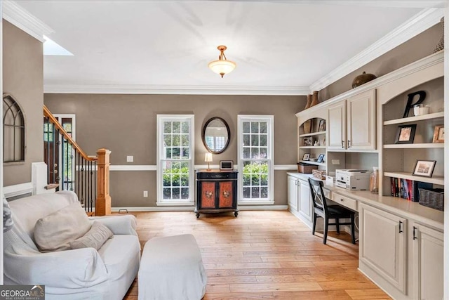 1637 Willow Way, Woodstock, GA 30188 - home office with built in study area, light wood-style flooring, ornamental molding, and baseboards