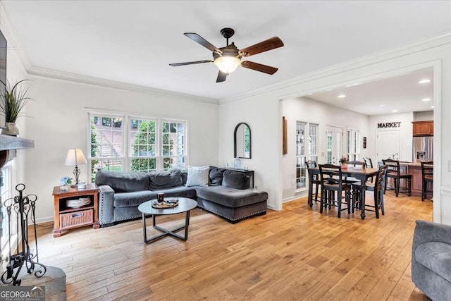 1637 Willow Way, Woodstock, GA 30188 - living area featuring a ceiling fan, light wood finished floors, crown molding, recessed lighting, and baseboards