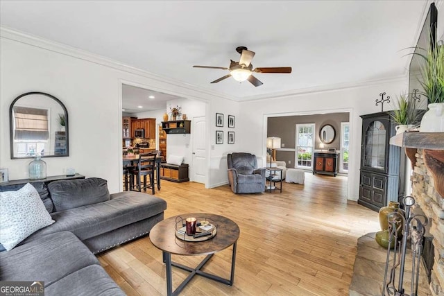 1637 Willow Way, Woodstock, GA 30188 - living area featuring a ceiling fan, light wood-style floors, crown molding, and recessed lighting