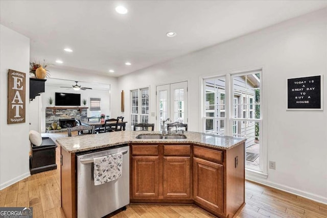 1637 Willow Way, Woodstock, GA 30188 - kitchen featuring dishwasher, a sink, french doors, open floor plan, and ceiling fan