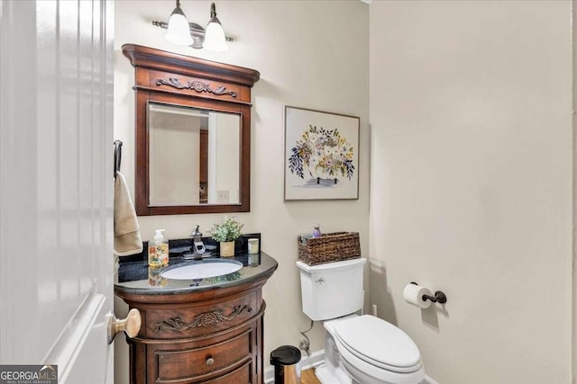 1637 Willow Way, Woodstock, GA 30188 - bathroom featuring vanity, toilet, and baseboards