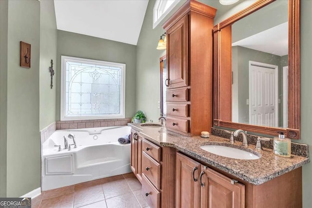 1637 Willow Way, Woodstock, GA 30188 - full bath featuring double vanity, a jetted tub, tile patterned flooring, and vaulted ceiling
