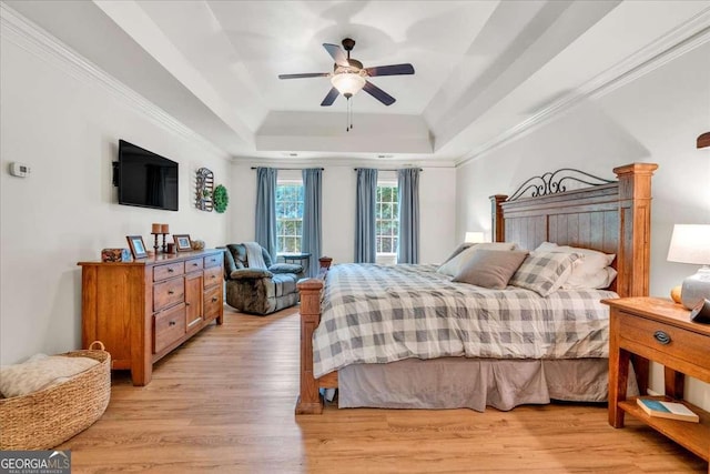 1637 Willow Way, Woodstock, GA 30188 - bedroom with a tray ceiling, light wood finished floors, and ceiling fan