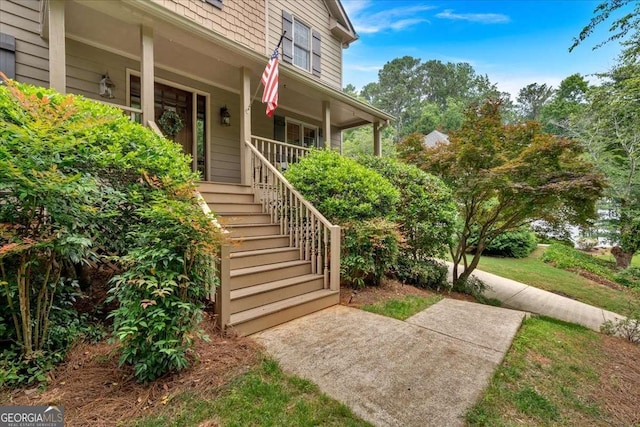1637 Willow Way, Woodstock, GA 30188 - doorway to property featuring covered porch