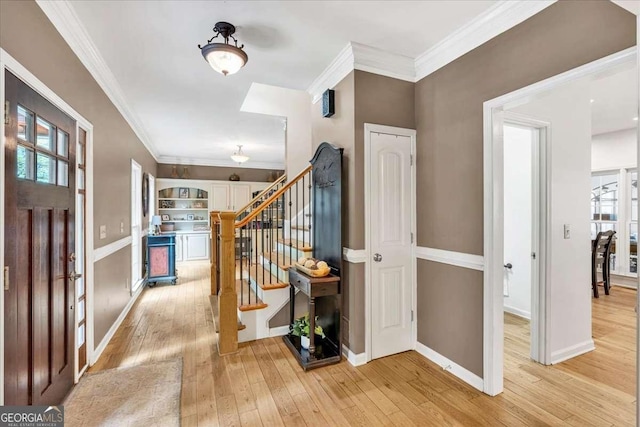 1637 Willow Way, Woodstock, GA 30188 - foyer with stairs, light wood-style floors, ornamental molding, and plenty of natural light
