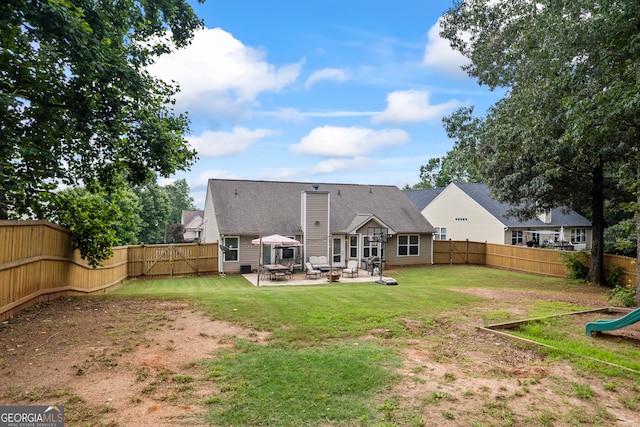 5511 Preserve Pt, Flowery Branch, GA 30542 - rear view of property featuring a patio area and a fenced backyard