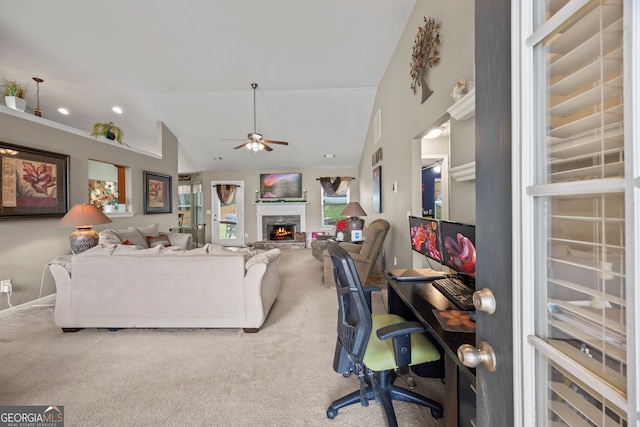 5511 Preserve Pt, Flowery Branch, GA 30542 - living room featuring ceiling fan, vaulted ceiling, carpet floors, and a fireplace