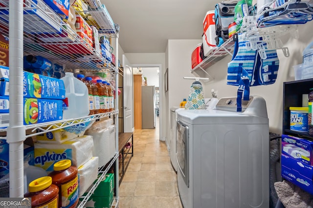 5511 Preserve Pt, Flowery Branch, GA 30542 - washroom with washer and clothes dryer