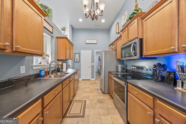 5511 Preserve Pt, Flowery Branch, GA 30542 - kitchen with stainless steel appliances, brown cabinets, dark countertops, and recessed lighting
