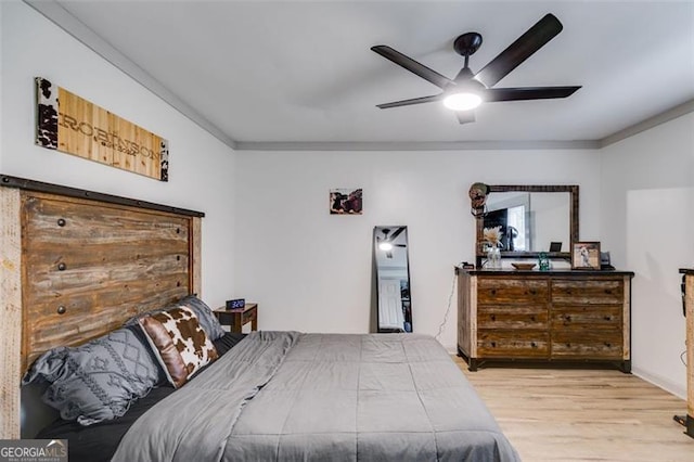 394 Knight Rd, Rockmart, GA 30153 - bedroom with wood finished floors, crown molding, and ceiling fan