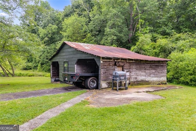 394 Knight Rd, Rockmart, GA 30153 - view of pole building with a lawn and a view of trees