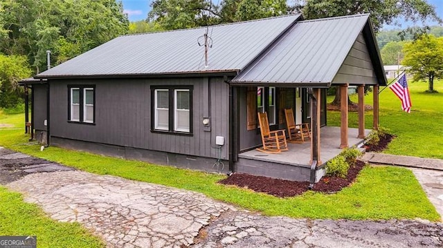 394 Knight Rd, Rockmart, GA 30153 - view of side of home with a yard and metal roof