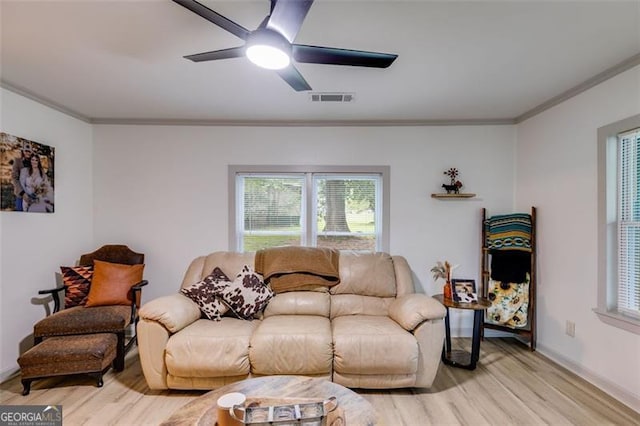 394 Knight Rd, Rockmart, GA 30153 - living area featuring light wood finished floors, ornamental molding, baseboards, and ceiling fan