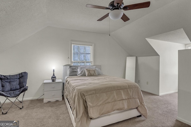 2715 N Doublegate Dr, Albany, GA 31721 - carpeted bedroom featuring vaulted ceiling, a ceiling fan, and a textured ceiling