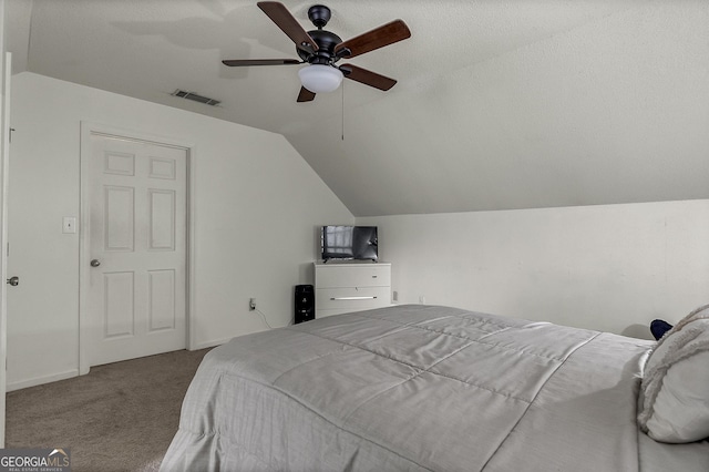 2715 N Doublegate Dr, Albany, GA 31721 - carpeted bedroom with vaulted ceiling and a ceiling fan