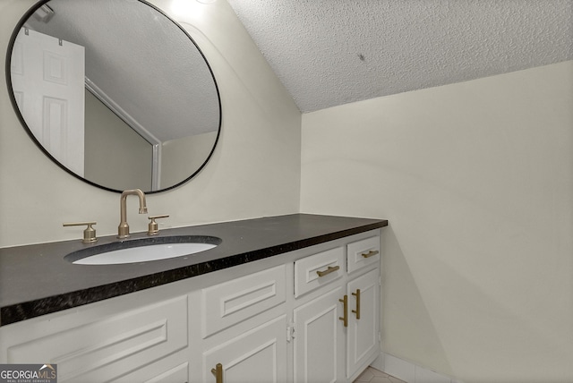 2715 N Doublegate Dr, Albany, GA 31721 - bathroom with a textured ceiling, vanity, and tile patterned flooring