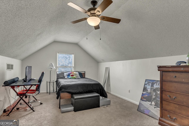 2715 N Doublegate Dr, Albany, GA 31721 - bedroom featuring a textured ceiling, ceiling fan, lofted ceiling, and carpet floors