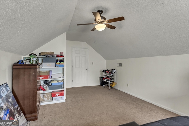 2715 N Doublegate Dr, Albany, GA 31721 - playroom with a ceiling fan, vaulted ceiling, carpet flooring, and a textured ceiling