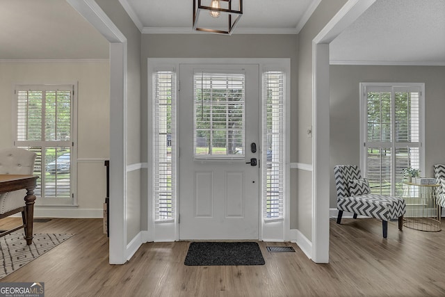 2715 N Doublegate Dr, Albany, GA 31721 - entrance foyer with wood finished floors and ornamental molding