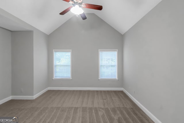 185 Stewart Glen Dr, Covington, GA 30014 - unfurnished room featuring a ceiling fan, carpet flooring, plenty of natural light, baseboards, and lofted ceiling
