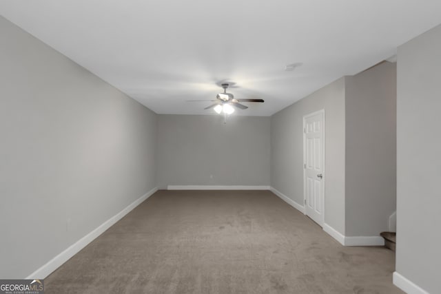 185 Stewart Glen Dr, Covington, GA 30014 - carpeted empty room with a ceiling fan and baseboards