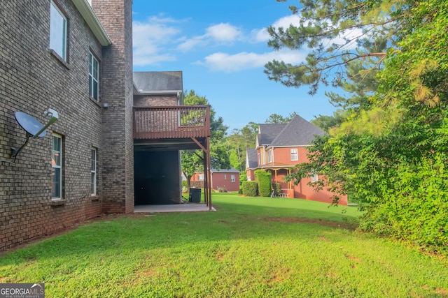 185 Stewart Glen Dr, Covington, GA 30014 - view of green lawn featuring a patio, a wooden deck, and central AC unit
