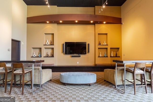 1080 Peachtree St NE Unit 2116, Atlanta, GA 30309 - living room with track lighting and a towering ceiling