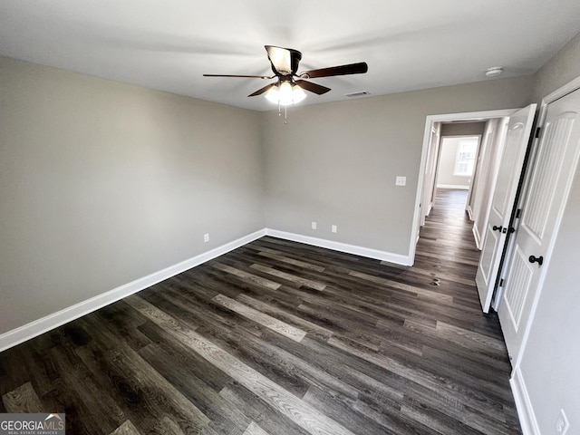 204 Eric Cv, Byron, GA 31008 - spare room featuring ceiling fan, dark wood finished floors, baseboards, and a smoke detector