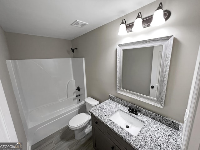 204 Eric Cv, Byron, GA 31008 - bathroom with toilet, vanity, and shower / bath combination