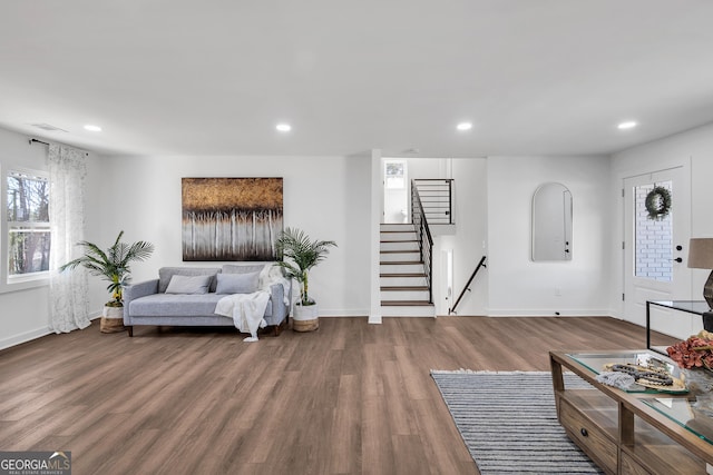 1536 Daffodil Dr, Marietta, GA 30062 - living area featuring stairs, wood finished floors, recessed lighting, and baseboards