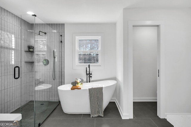 1536 Daffodil Dr, Marietta, GA 30062 - bathroom with a soaking tub, a shower stall, and tile patterned flooring