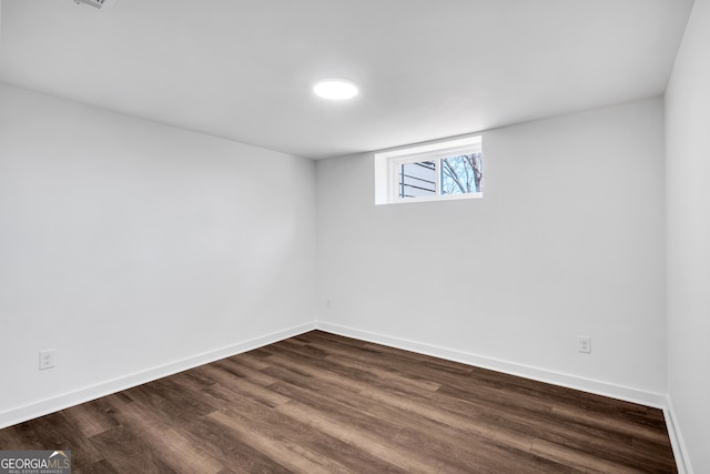 1536 Daffodil Dr, Marietta, GA 30062 - basement featuring dark wood finished floors and baseboards