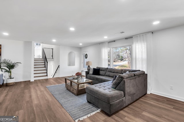 1536 Daffodil Dr, Marietta, GA 30062 - living area with stairway, recessed lighting, wood finished floors, and baseboards