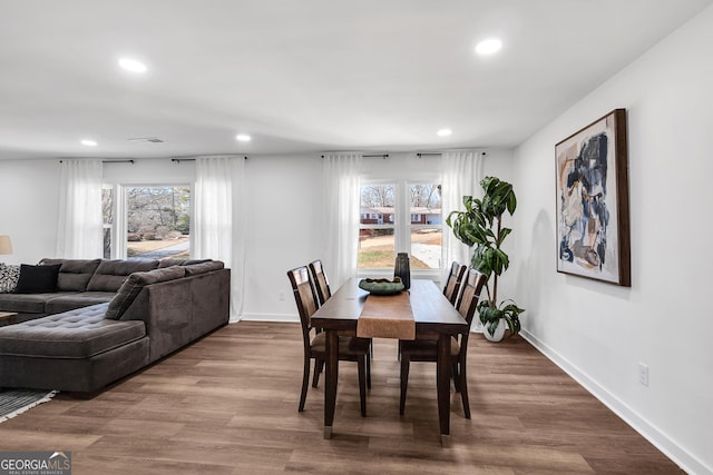 1536 Daffodil Dr, Marietta, GA 30062 - dining area with recessed lighting, baseboards, and wood finished floors