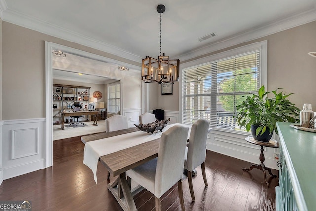 406 Fernstone Dr, Canton, GA 30114 - dining area featuring crown molding, an office area, a chandelier, a wainscoted wall, and dark wood-style floors