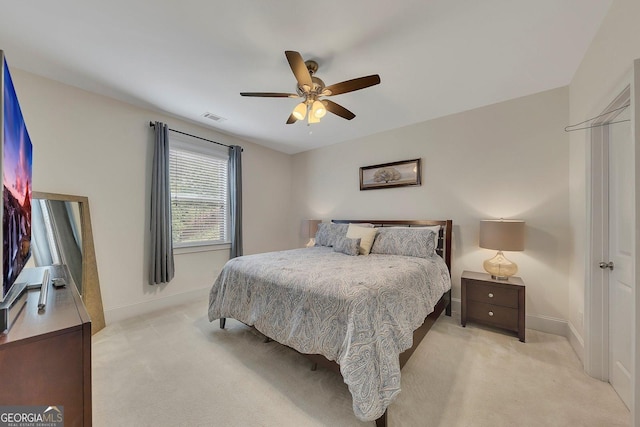 406 Fernstone Dr, Canton, GA 30114 - bedroom with light carpet, baseboards, and ceiling fan