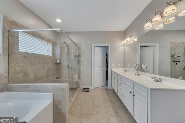 406 Fernstone Dr, Canton, GA 30114 - full bathroom with a bath, a stall shower, double vanity, tile patterned floors, and baseboards