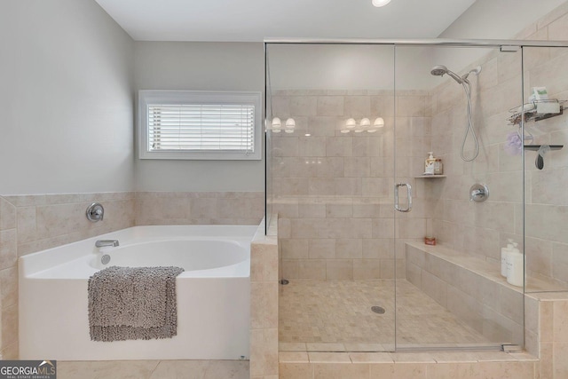 406 Fernstone Dr, Canton, GA 30114 - bathroom featuring a garden tub, a stall shower, and tile patterned floors