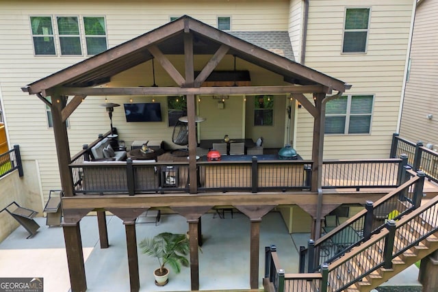 406 Fernstone Dr, Canton, GA 30114 - rear view of property with a gazebo, stairs, and a deck