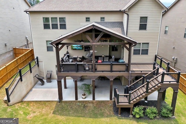 406 Fernstone Dr, Canton, GA 30114 - back of house featuring a ceiling fan, a patio, roof with shingles, and a gazebo