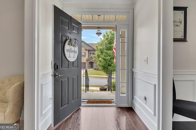 406 Fernstone Dr, Canton, GA 30114 - foyer with a decorative wall, wainscoting, and dark wood-style floors