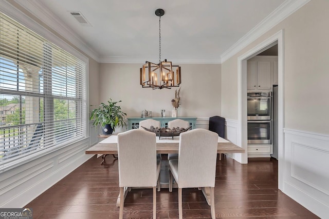 406 Fernstone Dr, Canton, GA 30114 - dining space featuring a chandelier, ornamental molding, dark wood-style flooring, and wainscoting